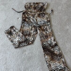 Bebe /XL / jumpsuit/ off shoulder / new with tags
